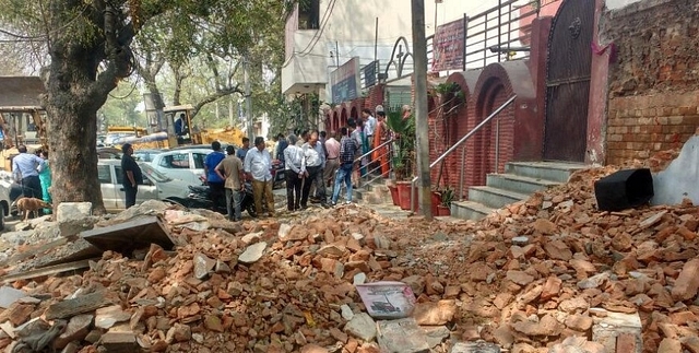 Rubble outside a temple adjoining Methodist Church in Mujherjee Nagar, Delhi