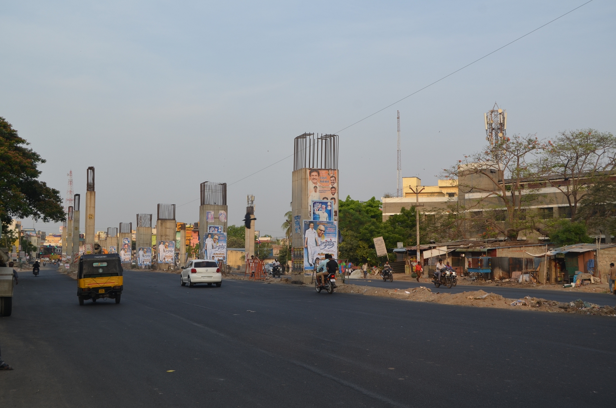 Pillars, errected for the Maduravoyal-Chennai port elevated corridor project, stand near Maduravoyal on Chennai-Bengaluru National Highway. &nbsp;