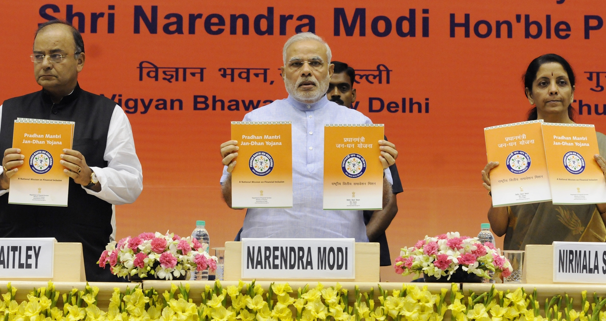 Prime Minister Narendra Modi launching the Pradhan Mantri Jan Dhan Yojana with Finance Minister Arun Jaitley and former Commerce Minister Nirmala Sitharaman in August 2014 (Mohd Zakir/Hindustan Times via Getty Images)