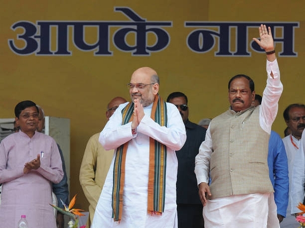 BJP President Amit Shah and Chief Minister Raghubar Das. (Diwakar Prasad/Hindustan Times via Getty Images)