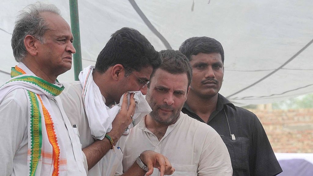 Senior Congress leader Ashok Gehlot, Rajasthan Congress president Sachin Pilot and Congress president Rahul Gandhi during a public meeting in Hanumangarh. (Himanshu Vyas/Hindustan Times via GettyImages)