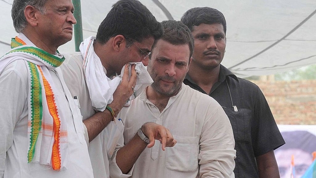 Senior Congress leader Ashok Gehlot, Rajasthan Congress president Sachin Pilot and Congress president Rahul Gandhi during a public meeting in Hanumangarh. (Himanshu Vyas/Hindustan Times via GettyImages)