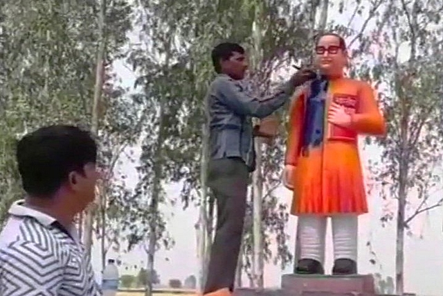 The Ambedkar statue being repainted. (pic via Twitter)