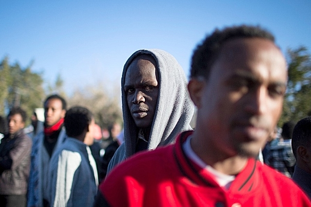 An African immigrant in Israel. (Uriel Sinai via GettyImages)