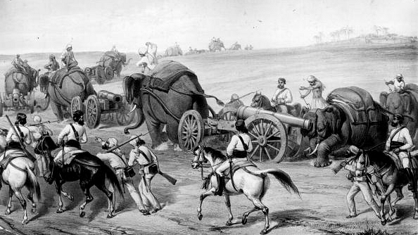 A group of Indian soldiers on their way to Delhi with elephants and cannons during the Indian Mutiny. Original Artwork: Entitled: The Advance Of The Siege Train To Attack Delhi by Captain G E Atkinson, Lithograph by W Simpson. (Hulton Archive/GettyImages)&nbsp;