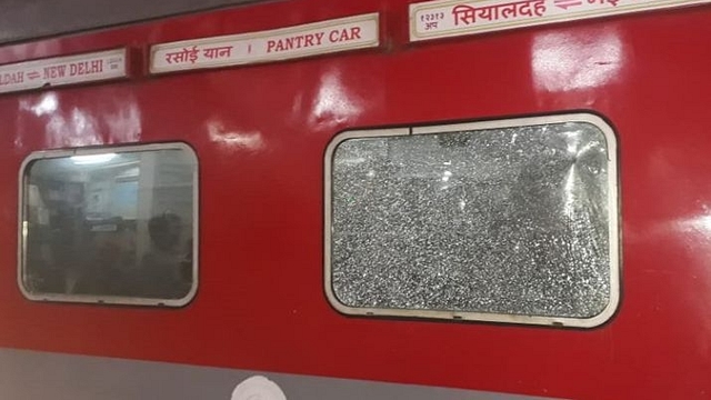 The Rajdhani Express’ shattered glass. (pic via Twitter)