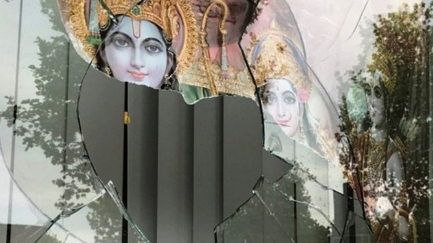 The temple’s broken window. (pic via Twitter)