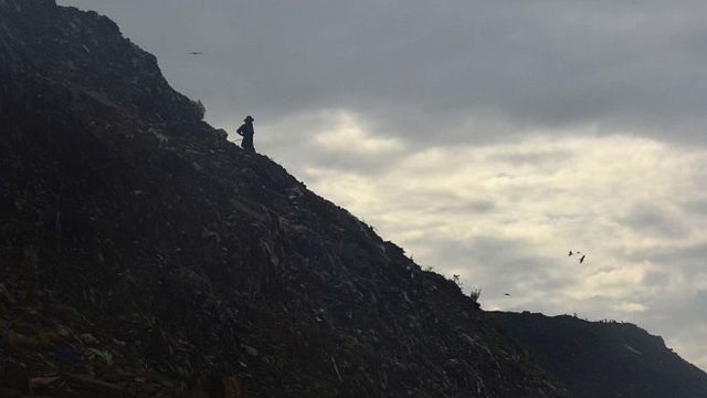 Local rag pickers working at Bhalswa landfill in New Delhi. (Raj K Raj/Hindustan Times via Getty Images)