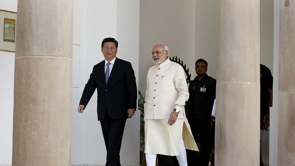 Chinese President Xi Jinping with PM Modi. (Arvind Yadav/Hindustan Times via Getty Images)