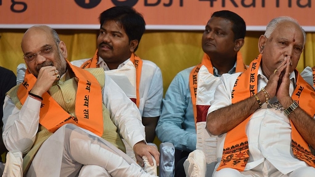 BJP President Amit Shah (L) and Karnataka Chief Minister B S Yeddyurappa. (Arijit Sen/Hindustan Times via Getty Images)