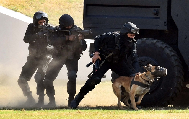 NSG commandos re-enact their counter-terrorism operations. (Raj K Raj/Hindustan Times via Getty Images)