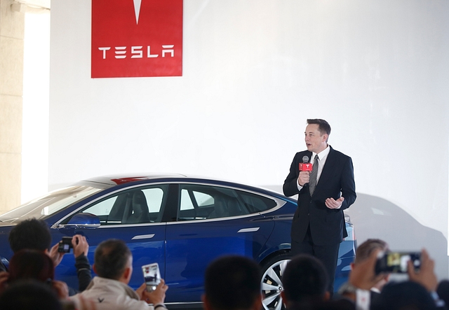 Elon Musk at the launch of the Tesla v7 operating system for the Tesla Model S in CHina (VCG/VCG via Getty Images)