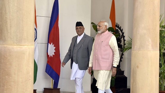 Prime Minister Narendra Modi with his Nepalese counterpart Khadga Prasad Sharma Oli before their meeting in New Delhi. (Sonu Mehta/Hindustan Times via Getty Images)&nbsp;