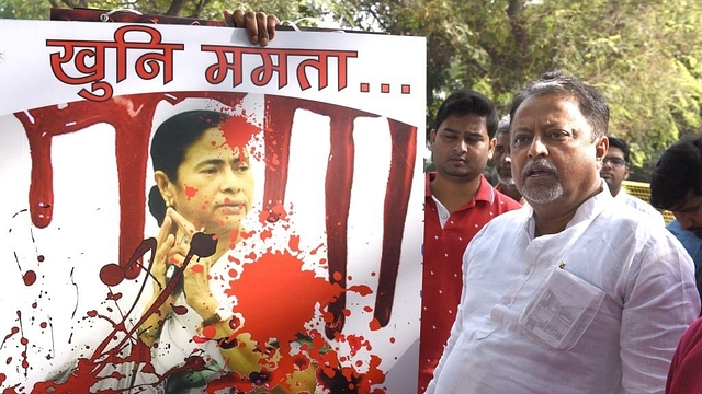 A BJP protest against widespread violence unleashed by TMC for the panchayat polls. (Arvind Yadav/Hindustan Times via Getty Images)