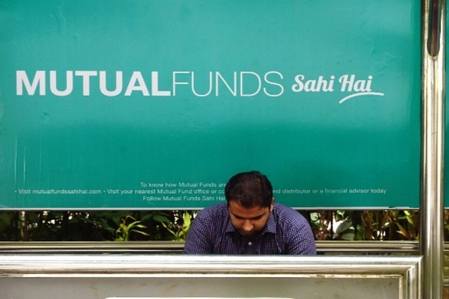 A bus stop with an advertisement promoting mutual funds (INDRANIL MUKHERJEE/AFP/Getty Images)