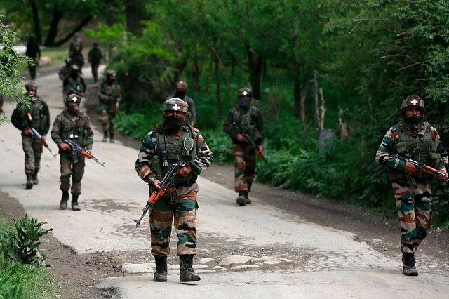 Indian Army soldiers during an operation against militants in Shopian district south of Srinagar. (Waseem Andrabi/Hindustan Times via GettyImages)