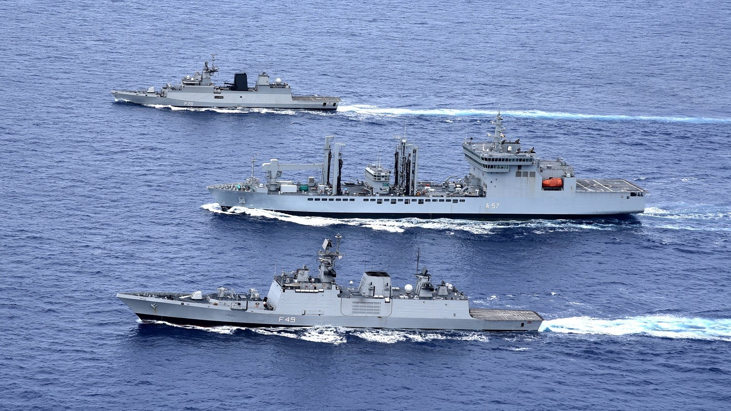 Indigenous stealth frigate INS Sahyadri, anti-submarine stealth corvette INS Kamorta and a fleet tanker. (Livefist/Twitter) 