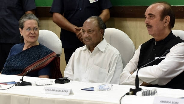 Sonia Gandhi, AK Antony (C) and Ghulam Nabi Azad (R) presides over the CWC meeting. (Mohd Zakir/Hindustan Times via Getty Images)