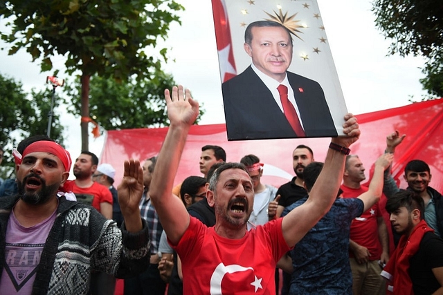 Erdogan’s supporters celebrate outside the AK party headquarters in Istanbul, Turkey. (Jeff J Mitchell/GettyImages)