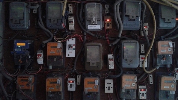 Electricity meters providing power supply in houses on March 10, 2014 in New Delhi, India. (Photo by Priyanka Parashar/Mint via Getty Images)