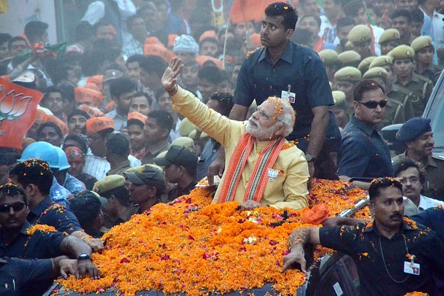 PM Modi with his security detail. (Adarsh Gupta/Hindustan Times via Getty Images)