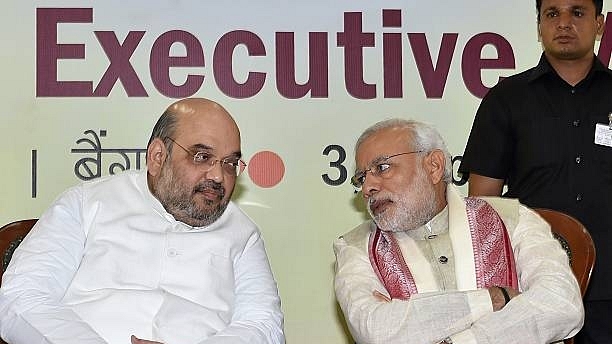 Prime Minister Narendra Modi and Union Home Minister Amit Shah. (MANJUNATH KIRAN/AFP/Getty Images)