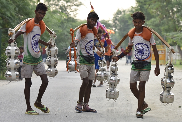 The Hindu devotees Kanwariyas carrying Ganga water return to Noida from Haridwar. (Virendra Singh Gosain/Hindustan Times via GettyImages)&nbsp;