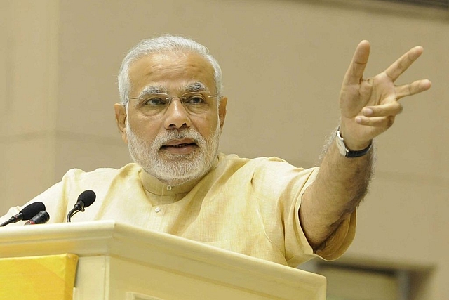 Prime Minister Narendra Modi speaking at the launch of Saansad Adarsh Gram Yojana in New Delhi. (Sushil Kumar/Hindustan Times via GettyImages)