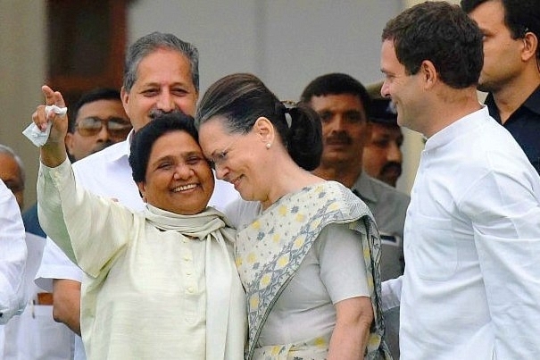 All smiles but no understanding? Mayawati (L) with Sonia and Rahul Gandhi. (Arijit Sen/Hindustan Times via Getty Images)