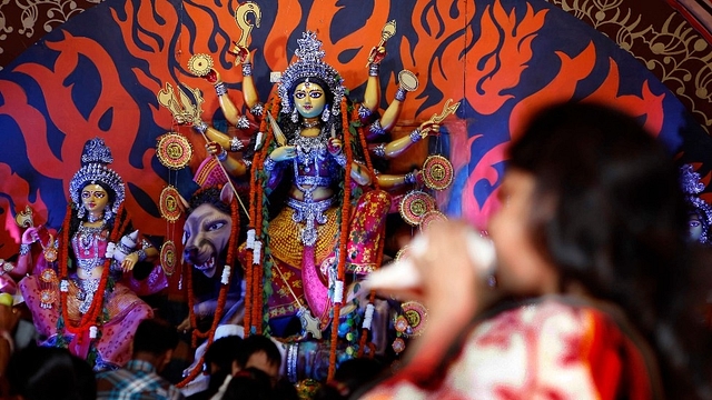 Priests performing rituals in front of  Goddess Durga (Raj K Raj/Hindustan Times via Getty Images)