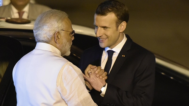 Prime Minister Narendra Modi with French President Emmanuel Macron. (Vipin Kumar/Hindustan Times via Getty Images)