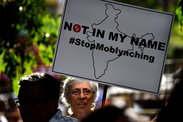  People participating in anti-lynching protest in Mumbai. (Pratik Chorge/Hindustan Times via Getty Images)