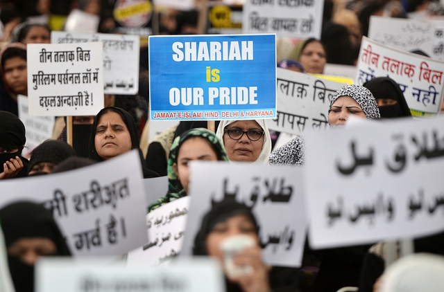 Muslim women display placards during a protest against ‘Triple Talaq’ bill. (K Asif/India Today Group/Getty Images)