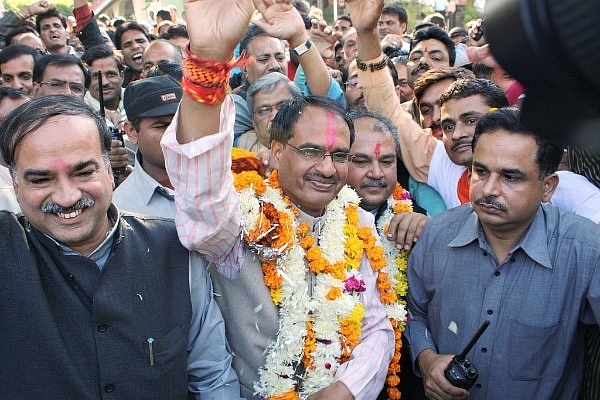 Madhya Pradesh Chief Minister Shivraj Singh Chouhan (C) (STR/AFP/Getty Images)