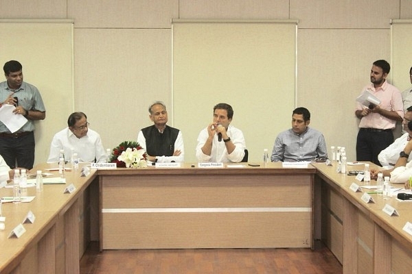 Praveen Chakravarty is seated to the left of Rahul Gandhi. (Praveen Chakravarty/Twitter)