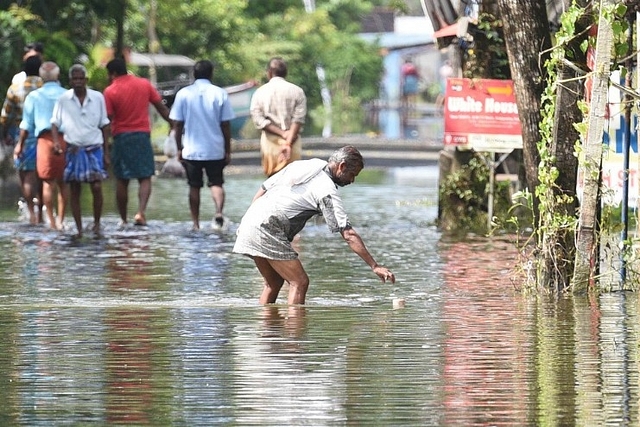 A flooded street in Alleppy (Raj K Raj/Hindustan Times via Getty Images)