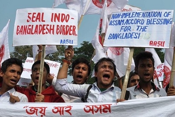 Members of a student union take part in a demonstration against illegal immigrants from Bangladesh. (time8.in)