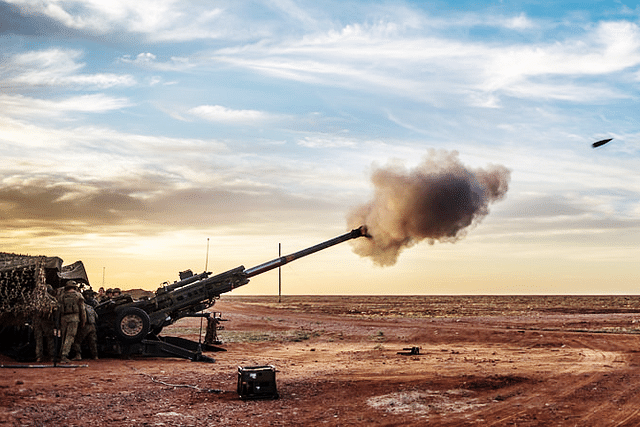 Australian Army soldiers from 8th/12th Regiment fire an M777 howitzer Exercise Predator’s Gallop in 2016. (World Armies/Flickr)