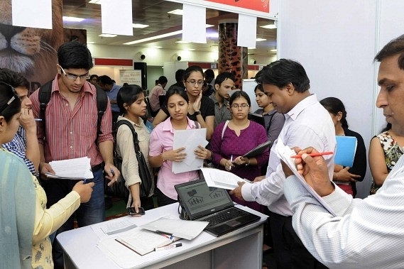 Students at a campus job fair organised by Delhi University Students Union in New Delhi. (Sushil Kumar/Hindustan Times via GettyImages)