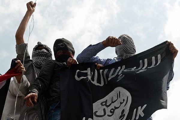 ISIS flags being waved in Kashmir in 2014 (TAUSEEF MUSTAFA/AFP/Getty Images) 