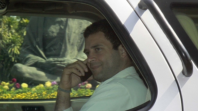 Rahul Gandhi talking on a phone in 2013 (Sonu Mehta/Hindustan Times via Getty Images)