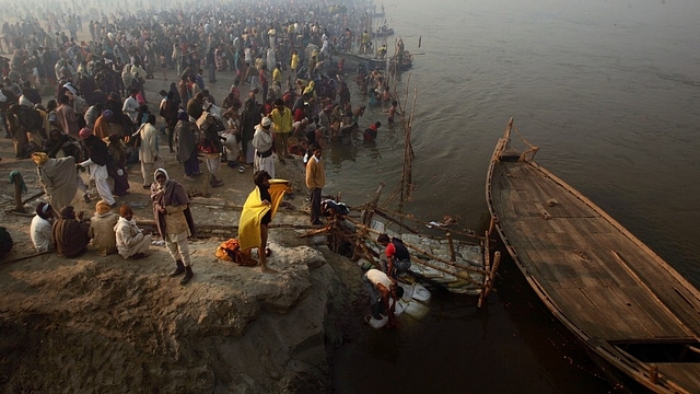 Hindu pilgrims gather to bathe at the ritual bathing site at Sangam, during the Kumbh Mela festival in Allahabad, India. (Mario Tama/Getty Images)