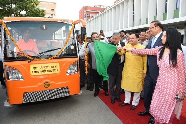 JP Nadda flagging off the free bus shuttle (@JPNadda/Twitter)