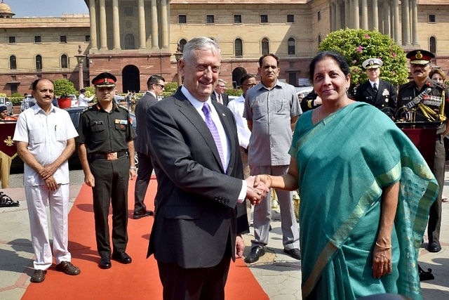  Indian Defence Minister Nirmala Sitharaman shakes hand with U.S. Defence Secretary Jim Mattis. (Ajay Aggarwal/Hindustan Times via Getty Images)&nbsp;