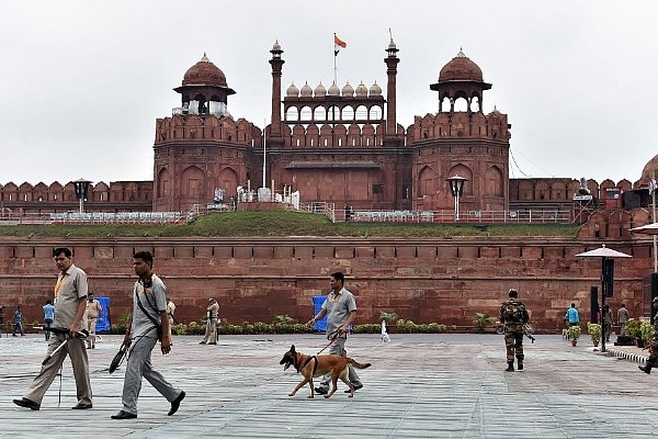 Security force personnel walk in front of the Red Fort in
New Delhi. (SAJJAD HUSSAIN/AFP/GettyImages)