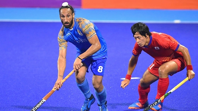 Sardar Singh at a match between Japan and India during the Asian Games in Jakarta, Indonesia. (Robertus Pudyanto/Getty Images)