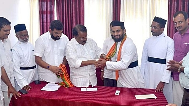 Father Geevargheese Kizhakkedath and Father Thomas Kulathungal joining BJP being greeted by PS Sreedharan Pillai, BJP Chief of Kerala Unit.(Pic:Twitter)