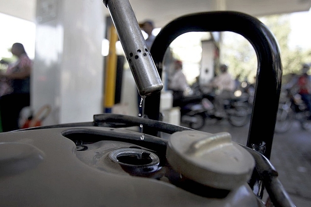 Bikers fill petrol on a fuel station in Kandivali near Mumbai.&nbsp; (Prasad Gori/Hindustan Times via GettyImages)