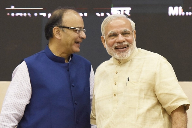 Corporate Affairs Minister Arun Jaitley with Prime Minister Narendra Modi (Vipin Kumar/Hindustan Times via Getty Images)