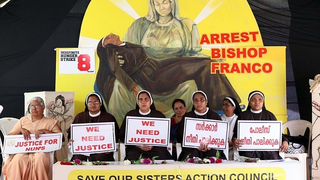 Nuns hold placards during a protest demanding justice after an alleged sexual assault of a nun by a bishop in Kochi, Kerala  (Vivek Nair/Hindustan Times via Getty Images)&nbsp;